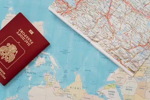 pexels-photo-7009468-7009468 Flat lay of a passport and map, symbolizing travel adventure and exploration.